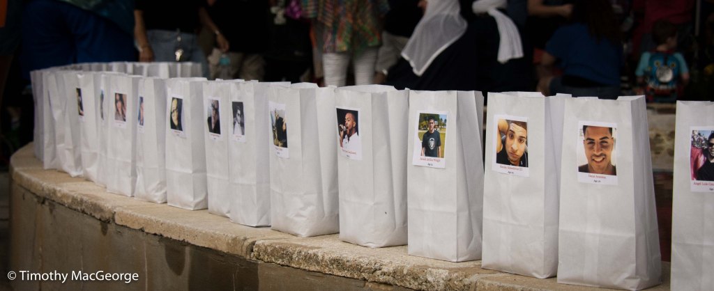 Names of the Orlando victims are displayed in luminaries at Fort Myers Vigil
